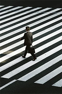 Business man in crosswalk